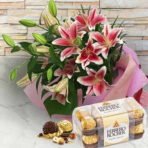 - Pink Lilies Bouquet And Chocolate Box For Wife